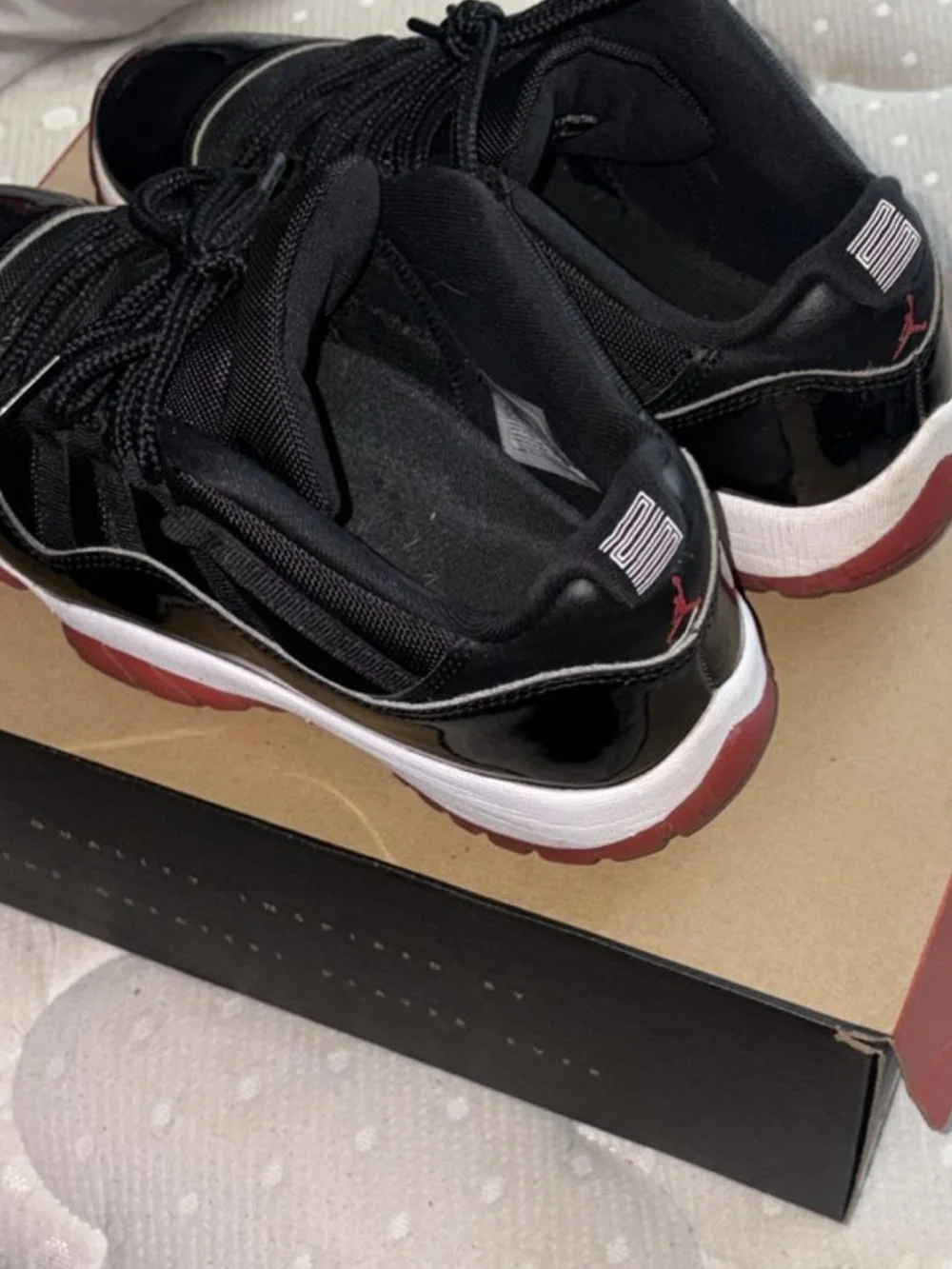 Black & Red Men’s Low-Top Jordan's 11 Athletic Sneakers